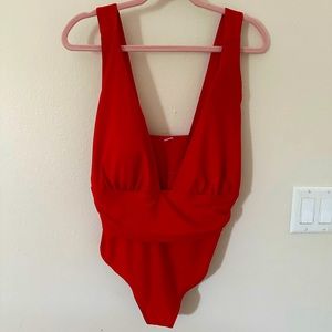 Beautiful One Piece Swimsuit.Get ready for Spring/Summer. This is a must have.